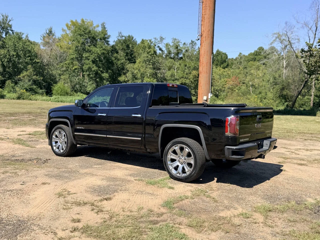 Used 2017 Black GMC Denali 4x4 4dr Crew Cab 5.8 ft. SB image 3