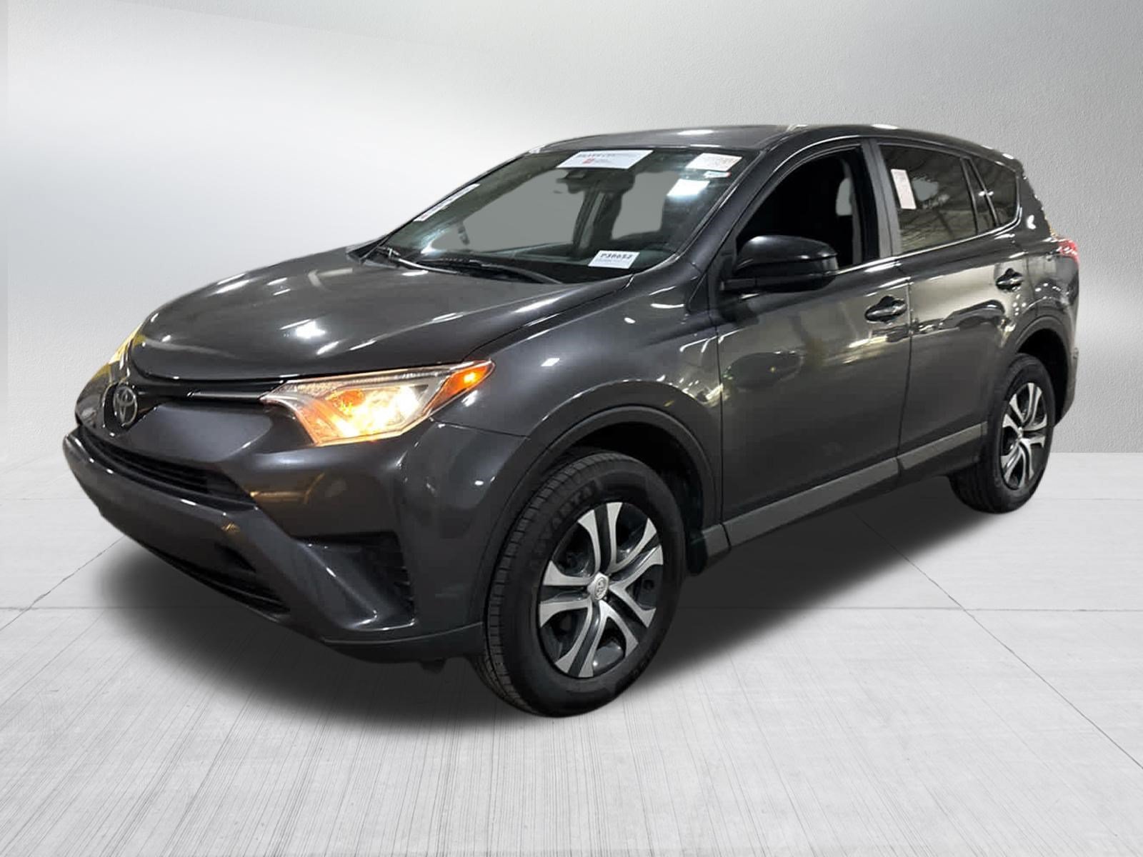 Used 2018 Magnetic Gray Metallic Toyota LE image 3