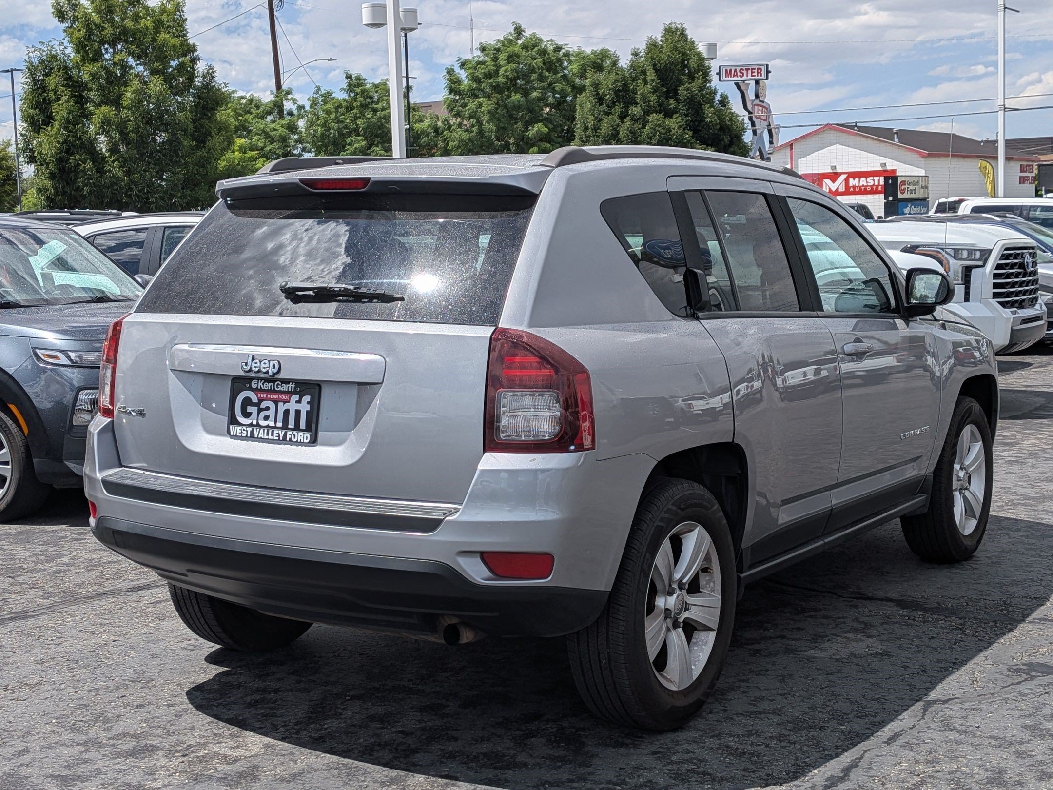 Used 2014 Billet Silver Clearcoat Metallic Jeep Sport image 3