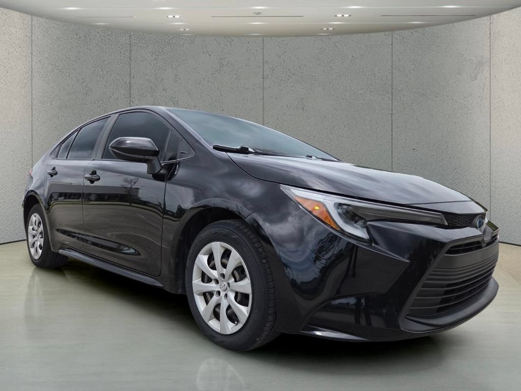 Used 2023 Midnight Black Metallic Toyota Hybrid LE image 13