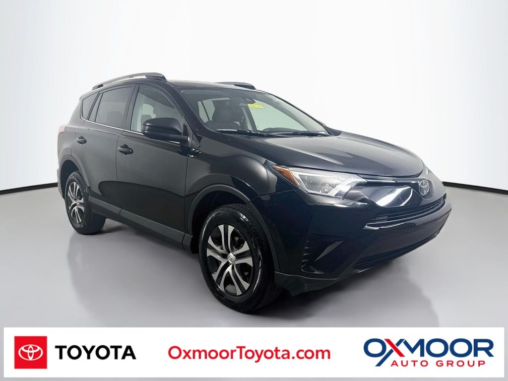 Used 2018 Gray Toyota LE image 1