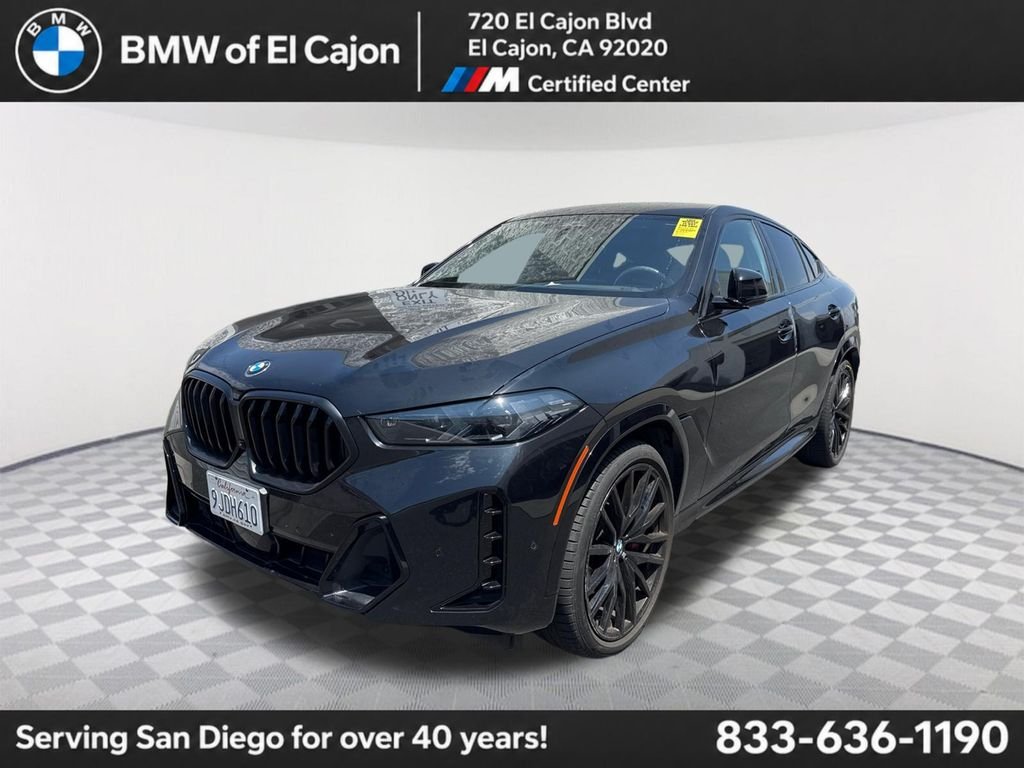 Used 2024 Black BMW xDrive40i image 1