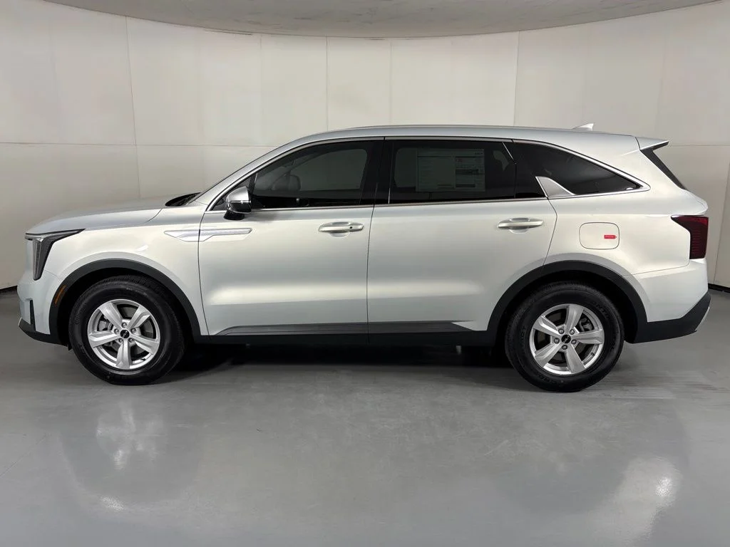New 2026 Ivory Silver Kia LX image 5