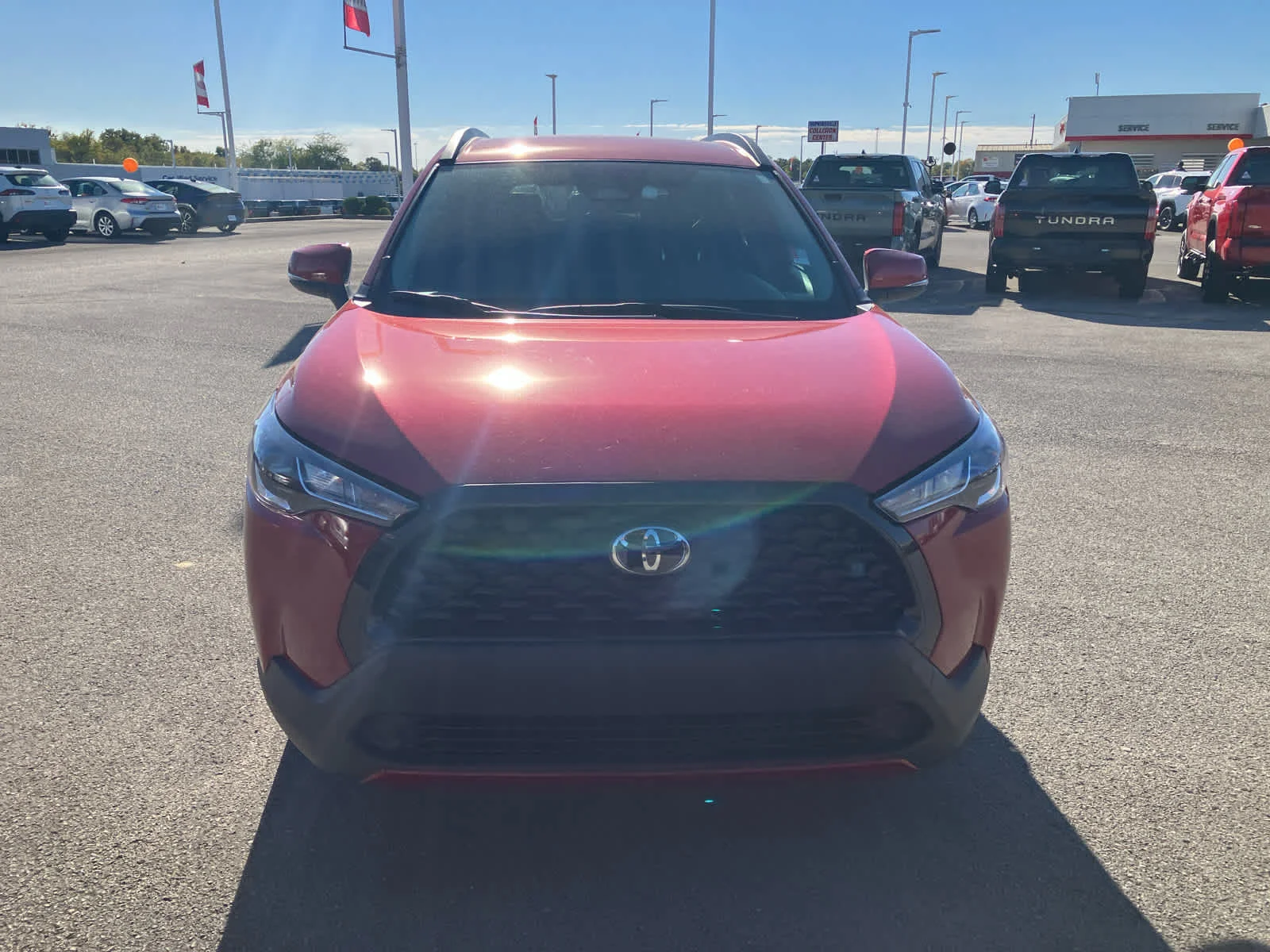 Used 2023 Barcelona Red Metallic Toyota LE image 2