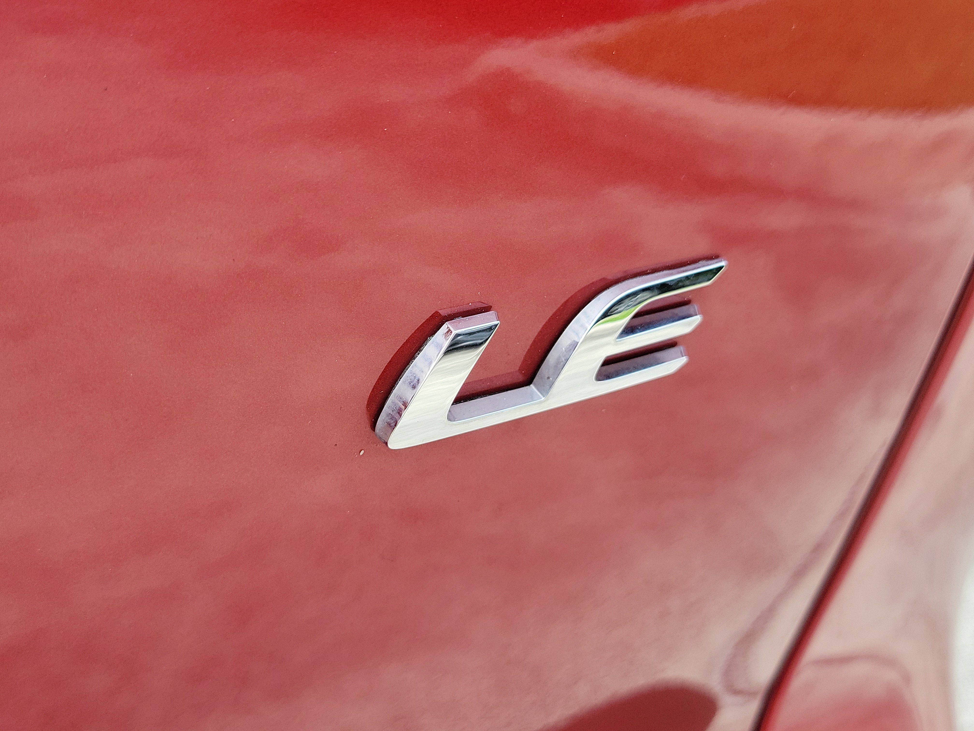 Certified Used 2023 Barcelona Red Metallic Toyota LE image 9