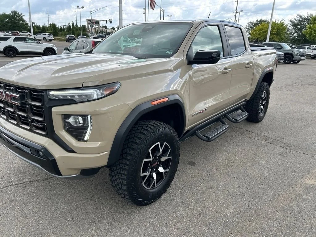 Used 2023 Desert Sand Metallic GMC AT4X image 5