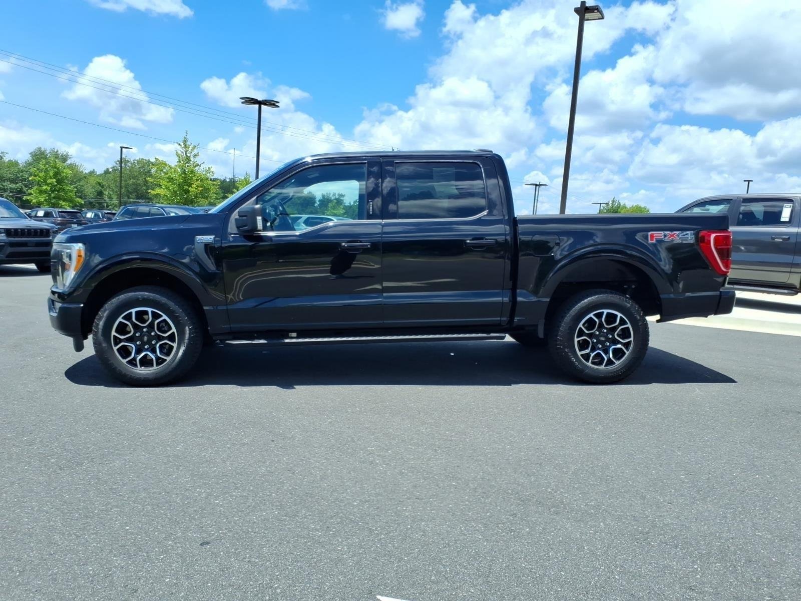 Used 2022 Agate Black Metallic Ford XLT image 3