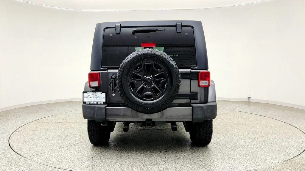 Used 2017 Granite Crystal Metallic Clearcoat Jeep Sahara 4x4 w/ Heated Seats, Remote Start & Connectivity Pkg image 6