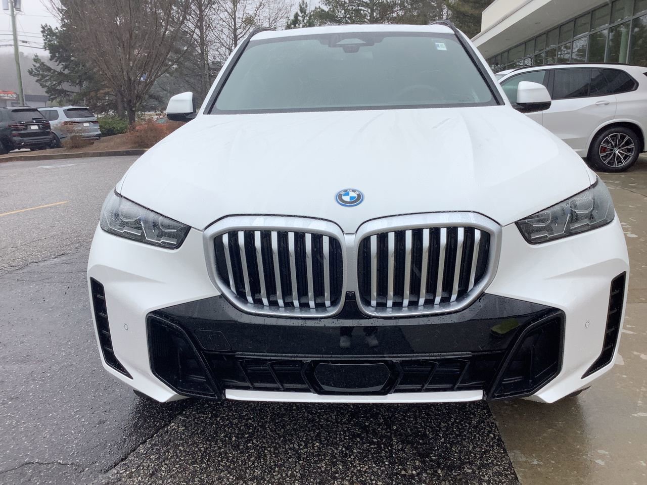 Used 2026 Mineral White Metallic BMW xDrive50e image 10