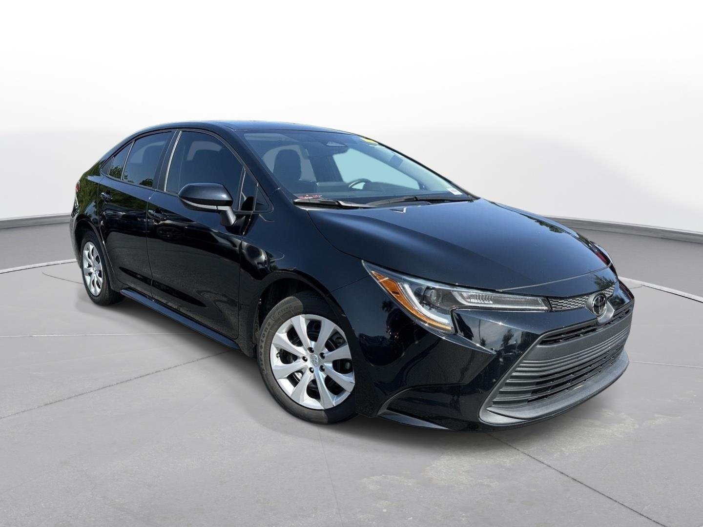 Used 2024 Midnight Black Metallic Toyota LE image 4