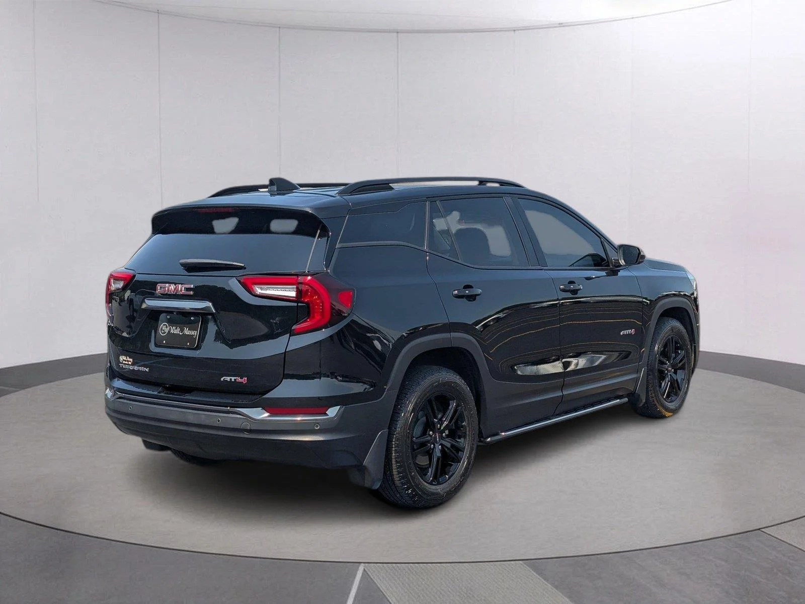 Used 2023 EBONY TWILIGHT METALLIC GMC AT4 image 5