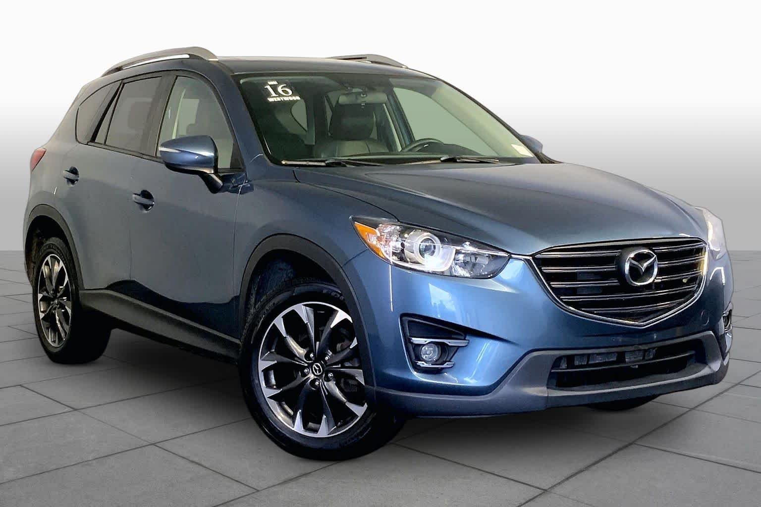 Used 2016 Blue Reflex Mica Mazda Grand Touring image 4