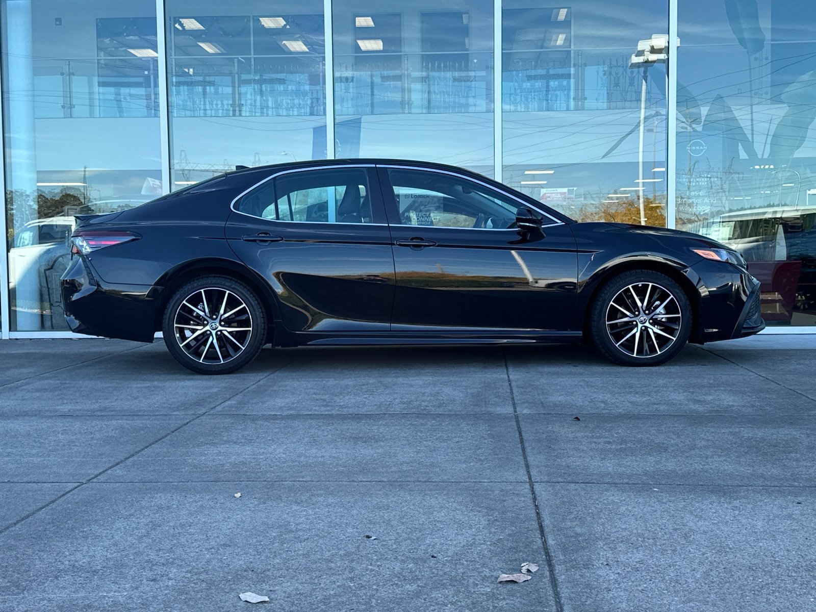 Used 2023 Midnight Black Metallic Toyota SE image 3