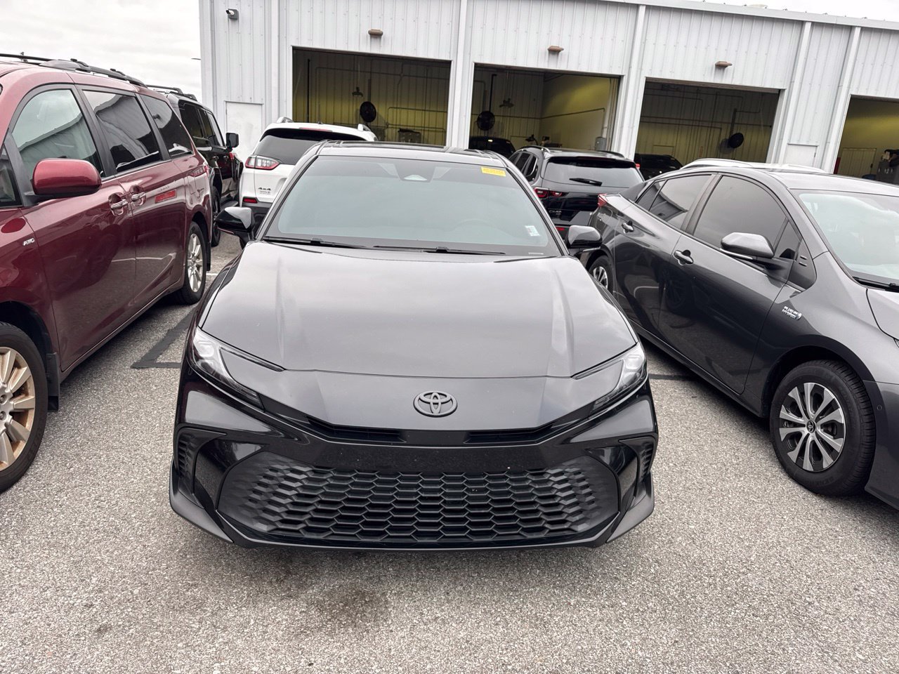 Used 2025 Black Toyota SE image 2