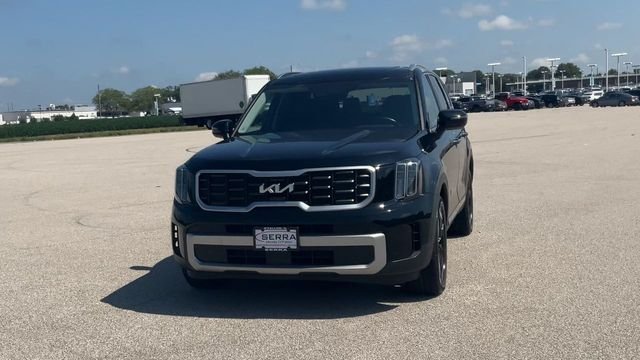 Used 2023 Ebony Black Kia S image 3