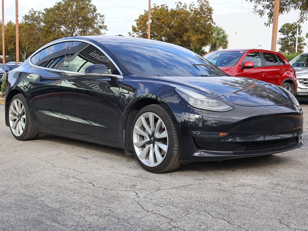 Used 2018 Tesla Model 3 Long Range with VIN 5YJ3E1EA5JF053642 for sale in Miami, FL