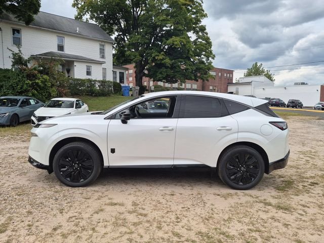 New 2027 Everest White Pearl TriCoat Nissan Dark Armor image 7