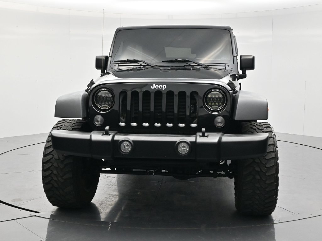 Used 2014 Jeep Wrangler Unlimited Sport with VIN 1C4BJWDG4EL313137 for sale in Minerva, OH