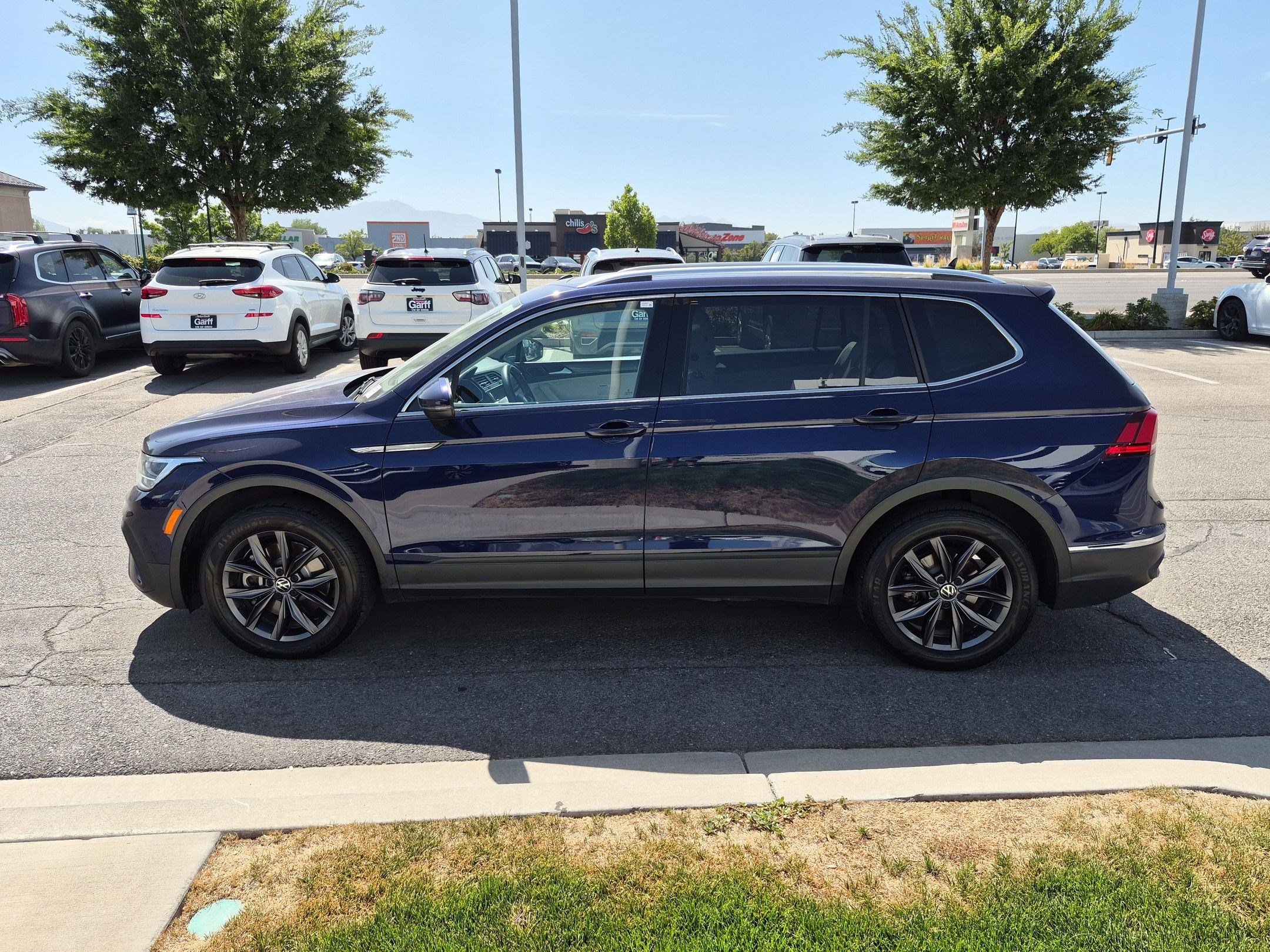 Used 2023 Atlantic Blue Metallic Volkswagen SE image 7