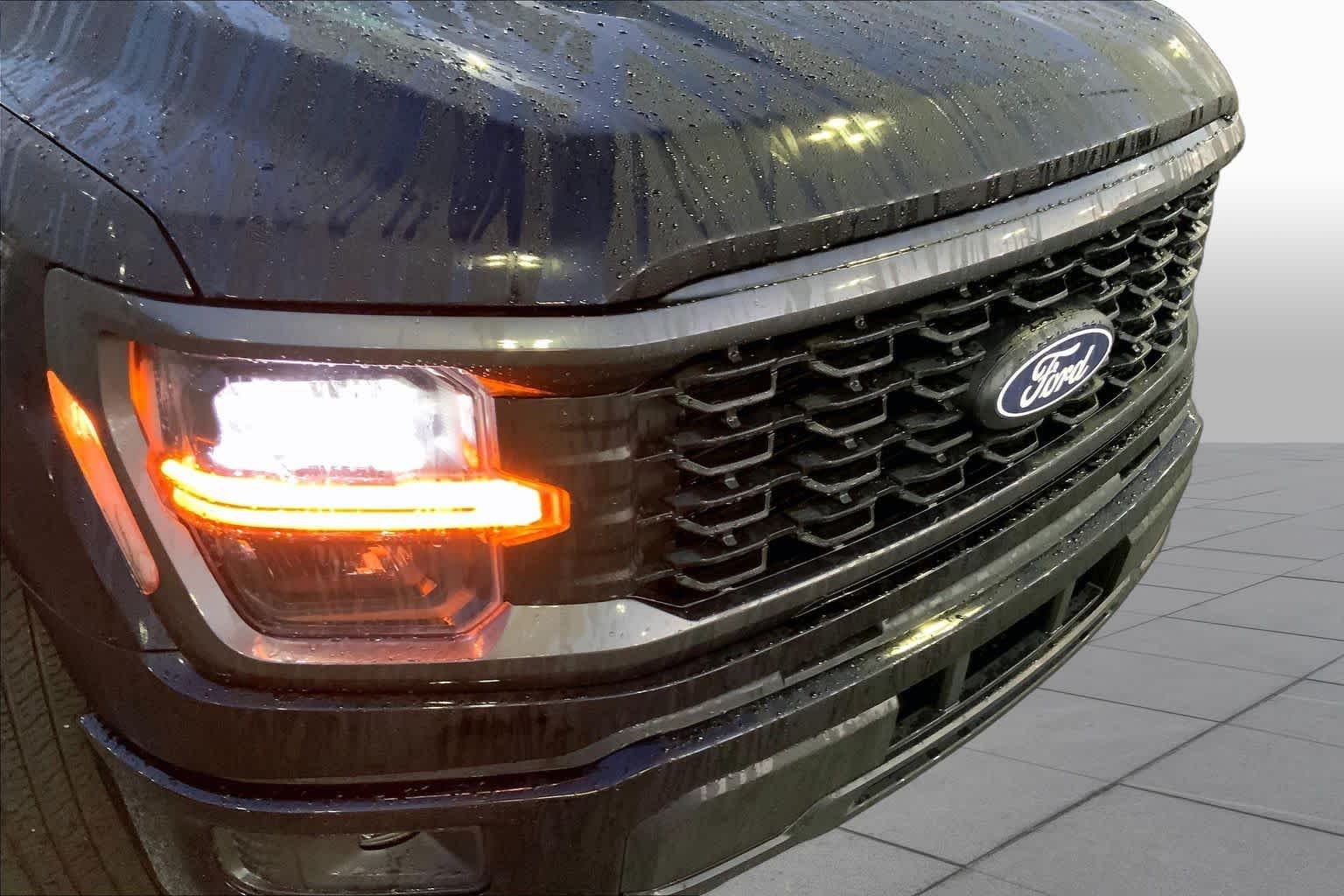 Used 2025 Agate Black Metallic Ford STX image 28