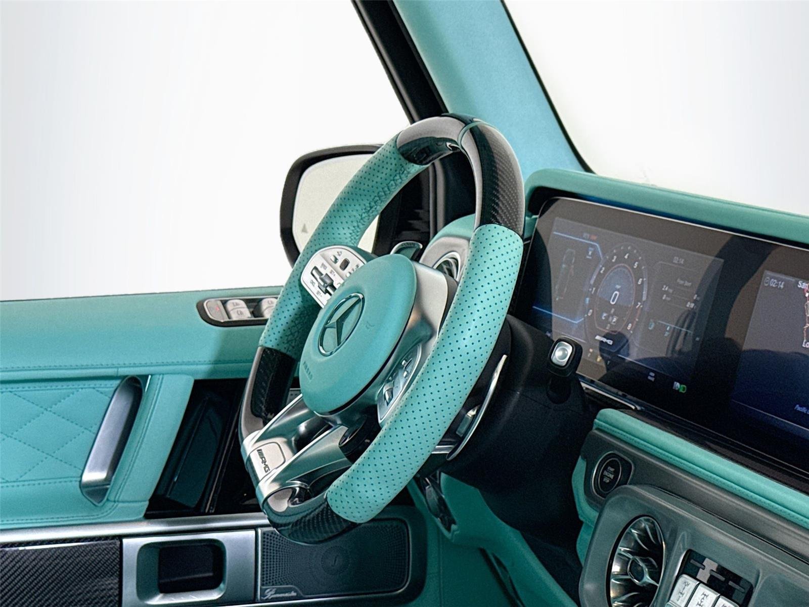 Used 2024 Polar White Mercedes-Benz AMG® G 63  Brabus Custom Widebody / Custom Tiffany Interior image 32