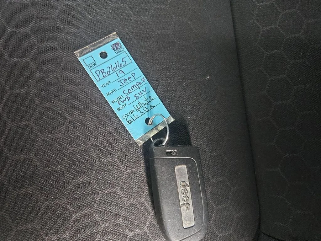 Used 2019 White Clearcoat Jeep Sport image 35
