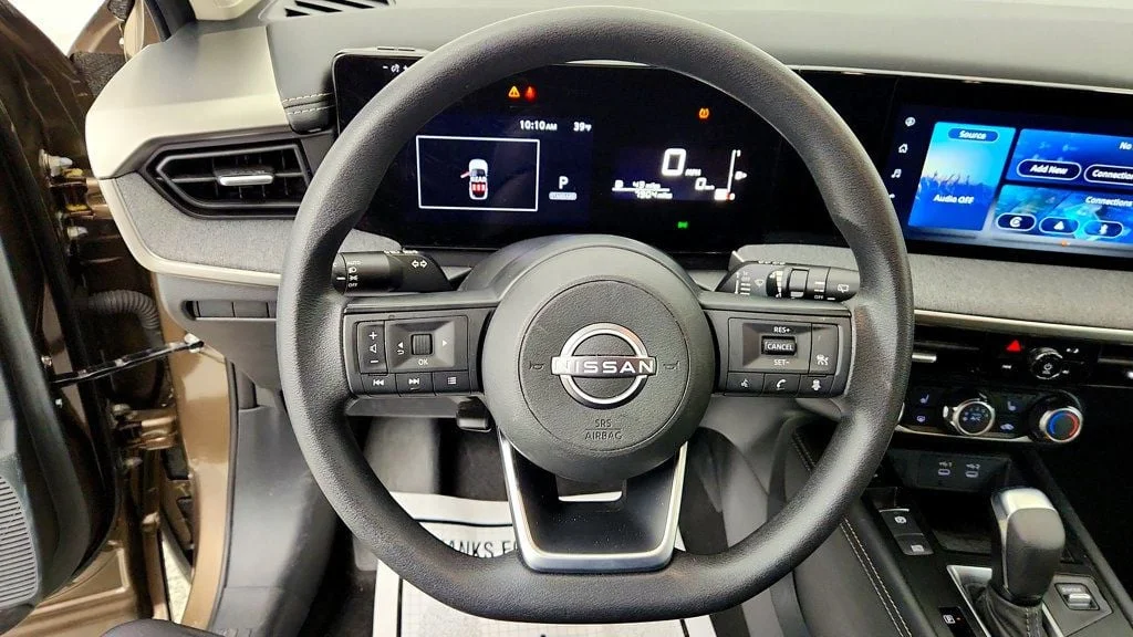 Used 2025 Canyon Bronze Metallic Nissan SV AWD image 14