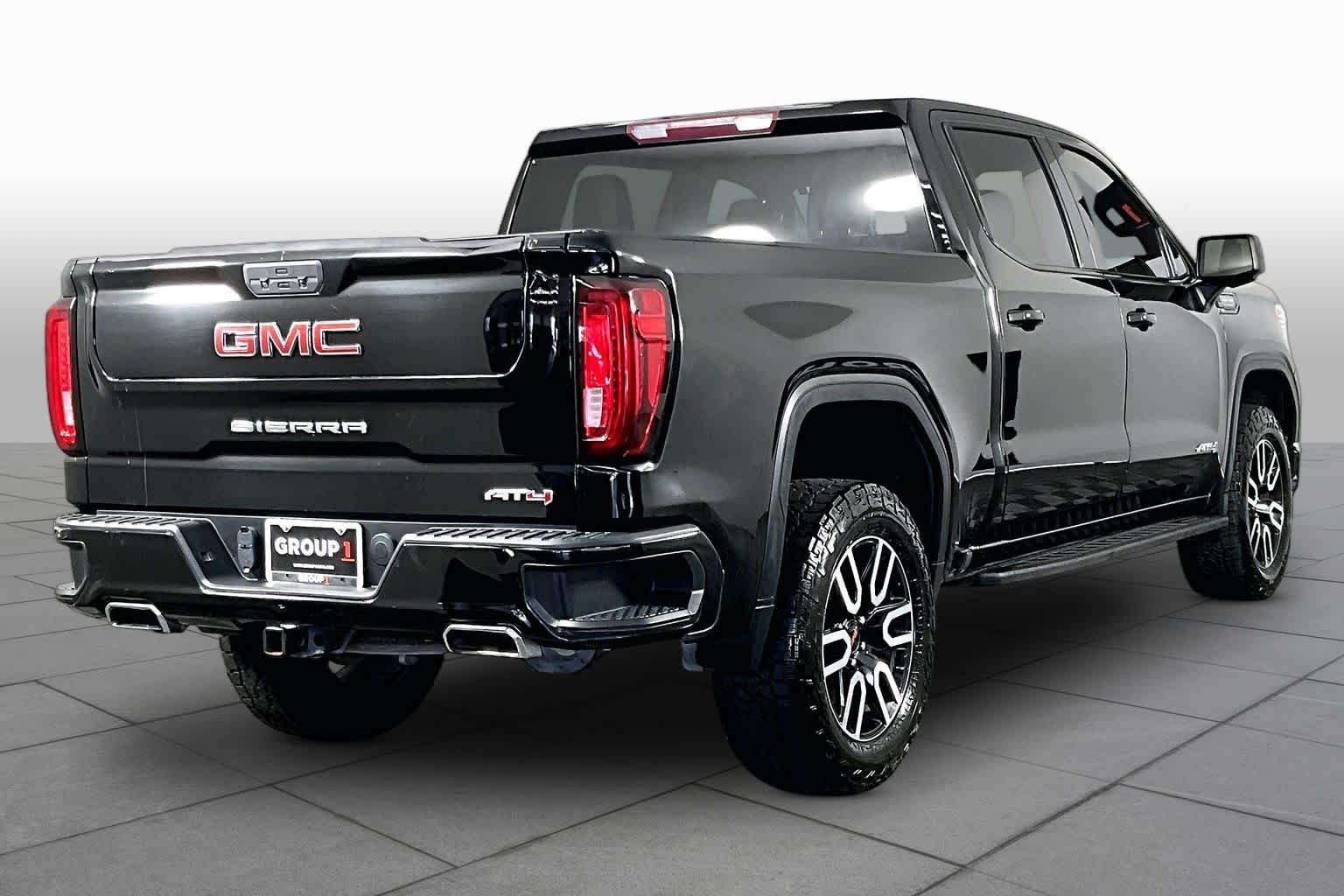 Used 2021 EBONY TWILIGHT METALLIC GMC AT4 image 13