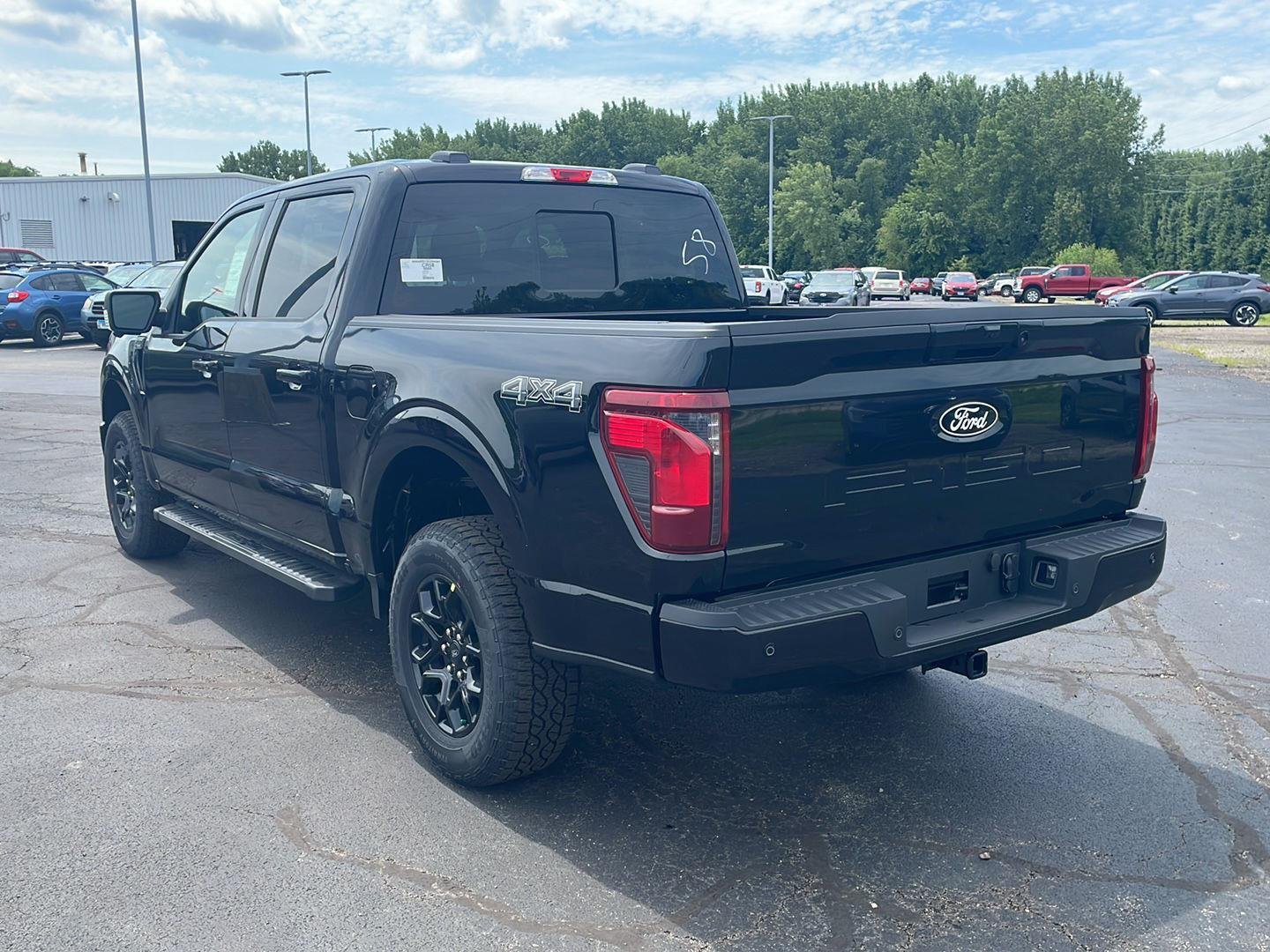 New 2026 Agate Black Metallic Ford XLT image 3