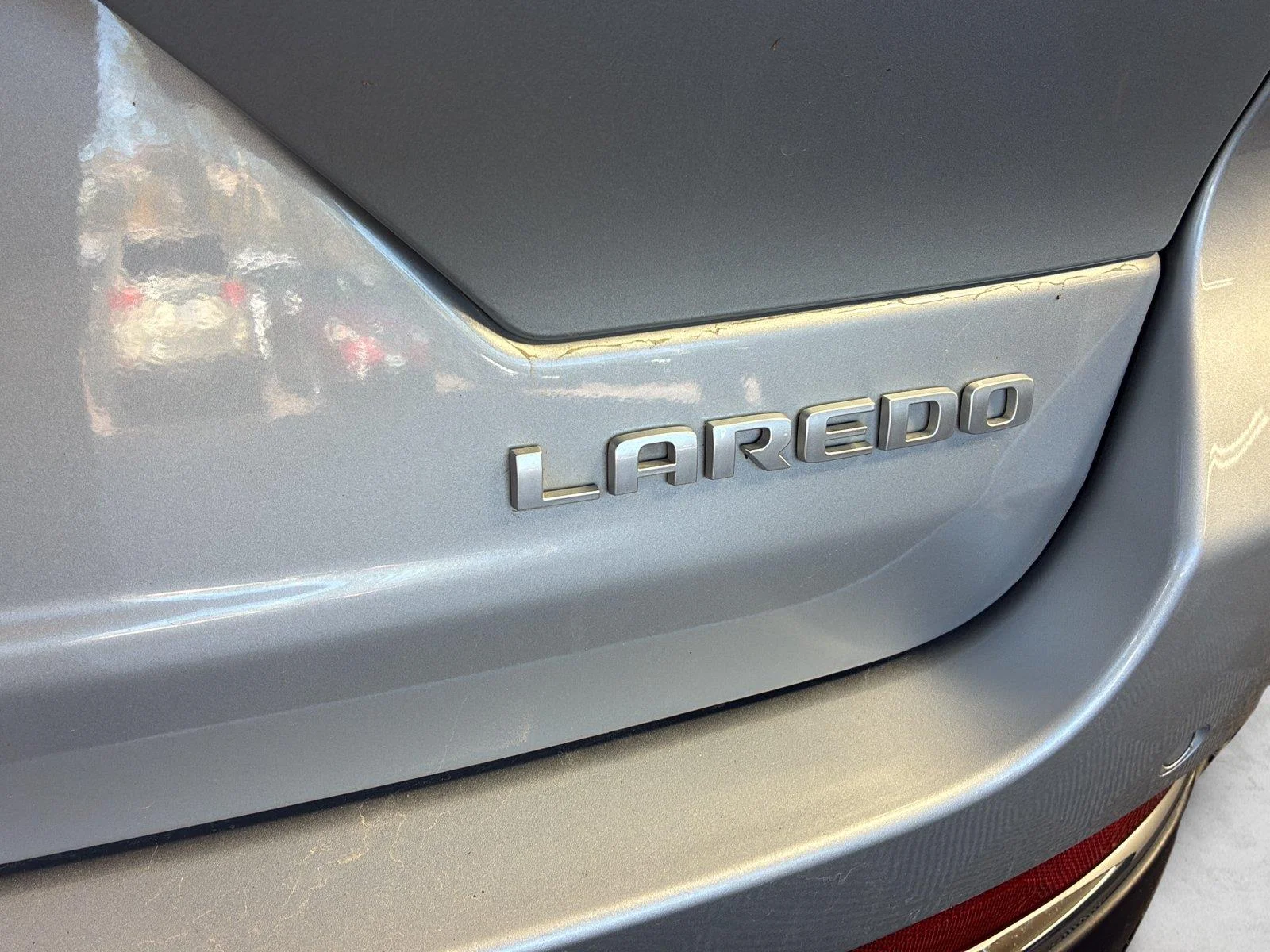 Used 2024 Silver Zynith Jeep Laredo X image 8