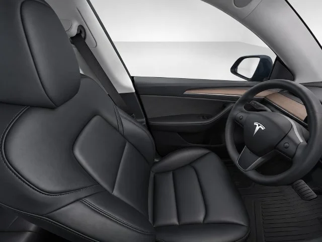 Used 2023 Solid Black Tesla Performance image 11
