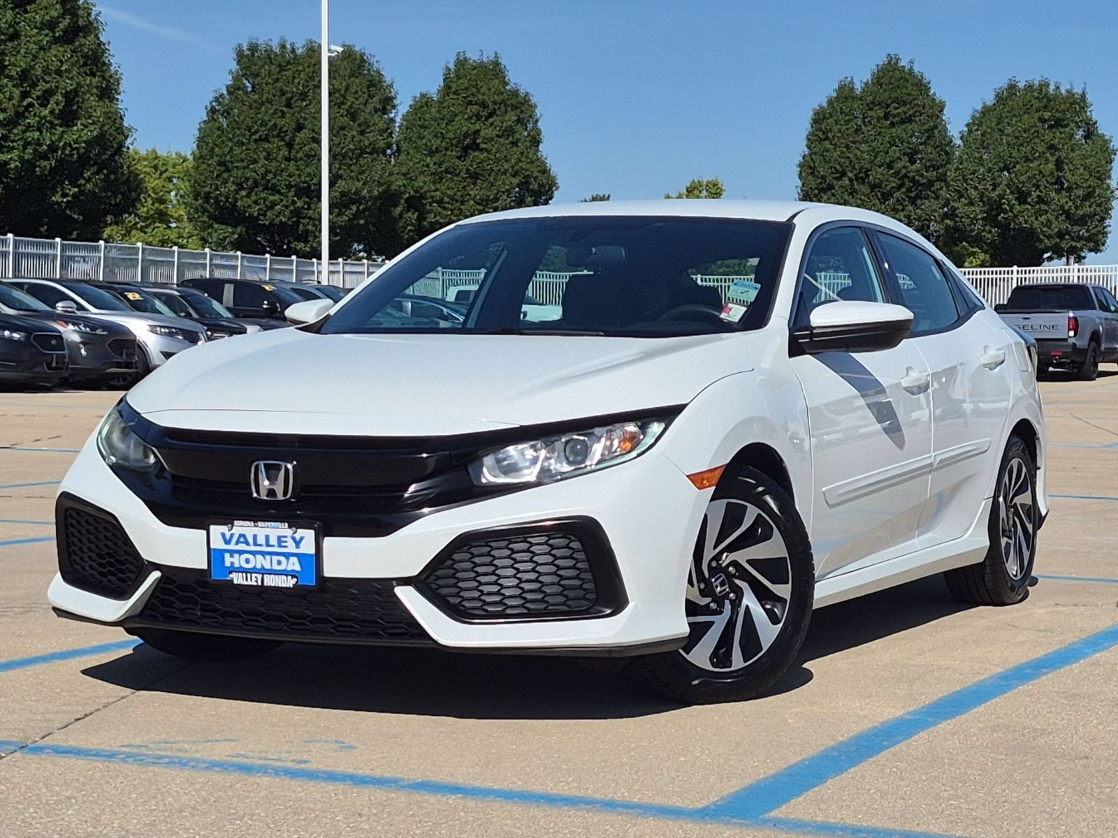 Used 2017 White Orchid Pearl Honda LX Hatchback image 2