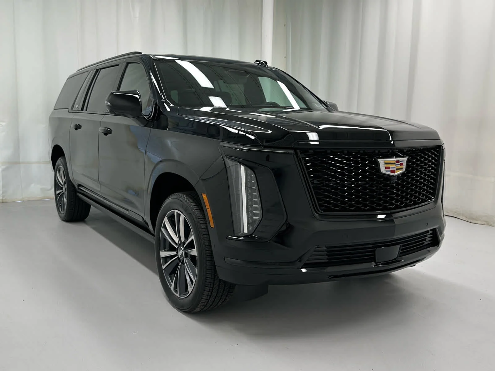 Used 2026 Black Raven Cadillac 4WD Sport image 2