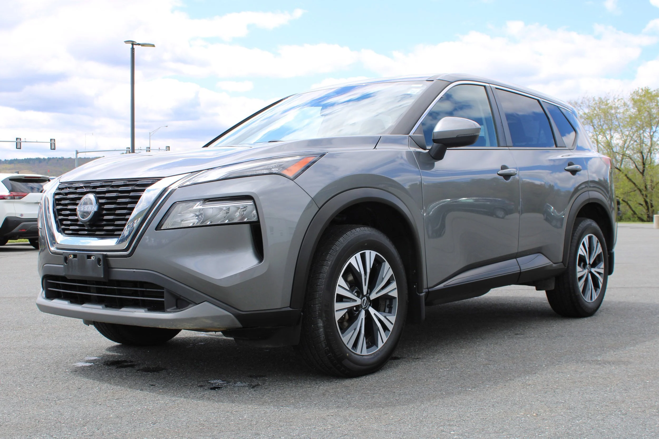 Used 2023 Gun Metallic Nissan SV image 1