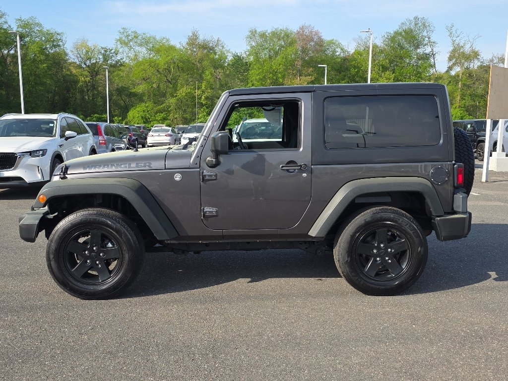 Used 2016 Granite Crystal Metallic Clear Coat Jeep Sport image 12