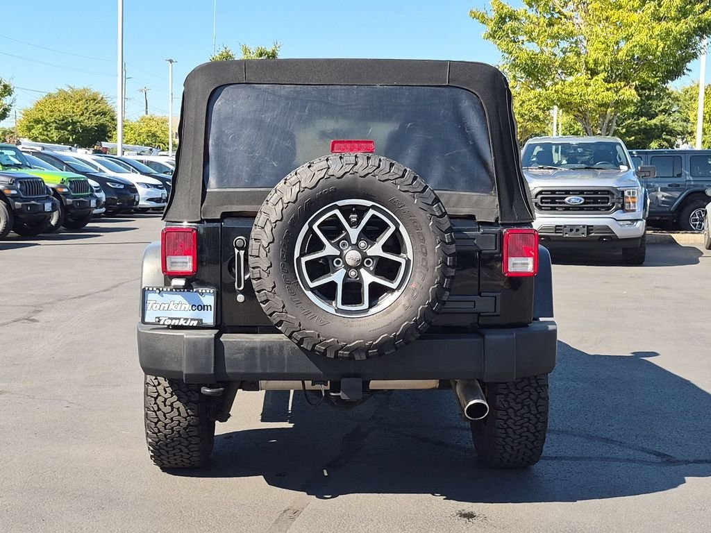 Used 2015 Black Clearcoat Jeep Unlimited Sport image 5