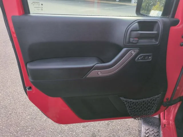 Used 2016 Red Jeep Unlimited Sport image 12