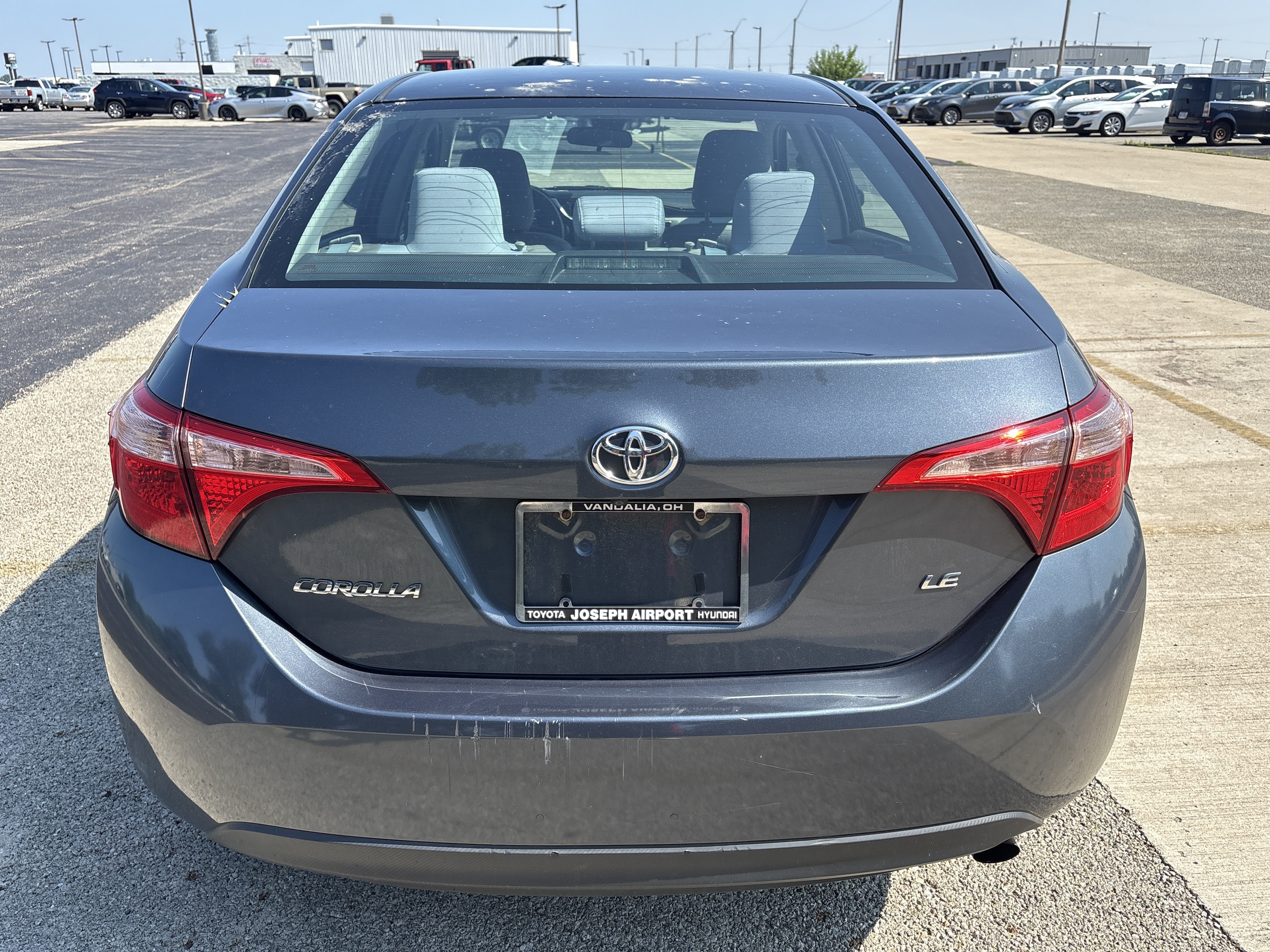 Used 2017 Slate Metallic Gray Toyota LE image 4