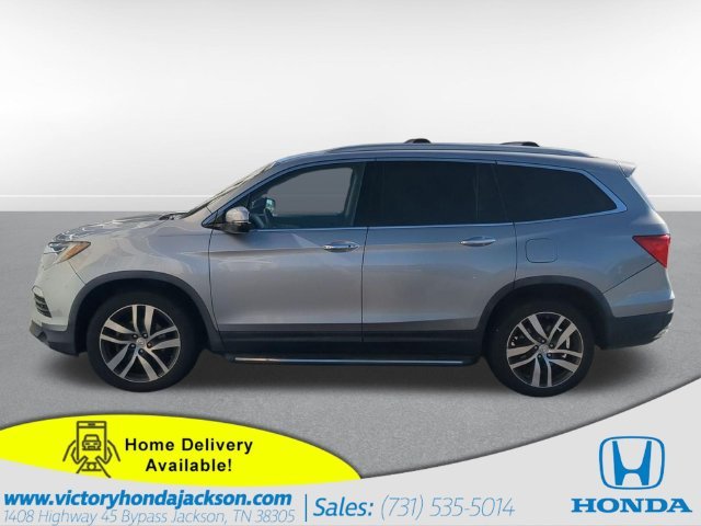 Used 2017 Lunar Silver Metallic Honda Touring image 1