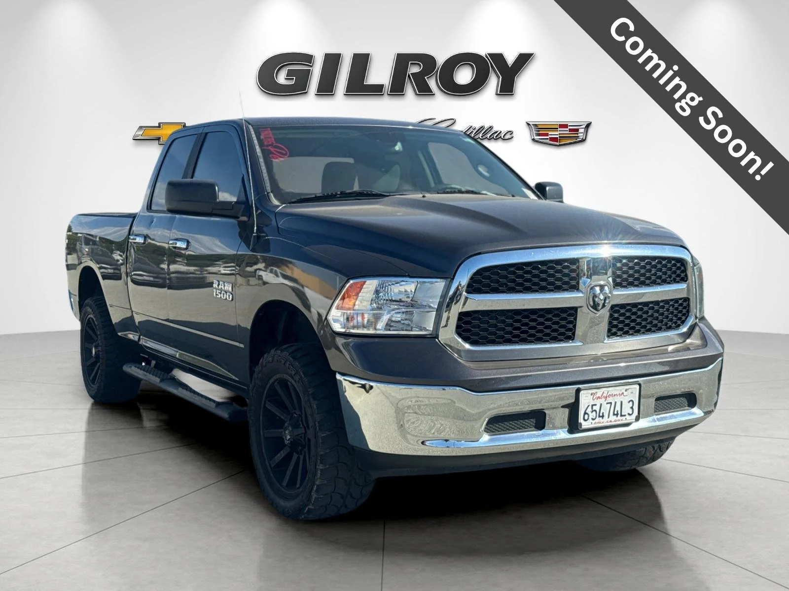 Used 2015 Granite Crystal Metallic Clearcoat Ram SLT image 1