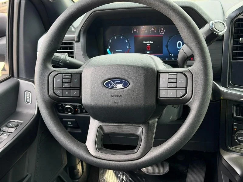 New 2026 Agate Black Metallic Ford STX 4WD SuperCrew 5.5