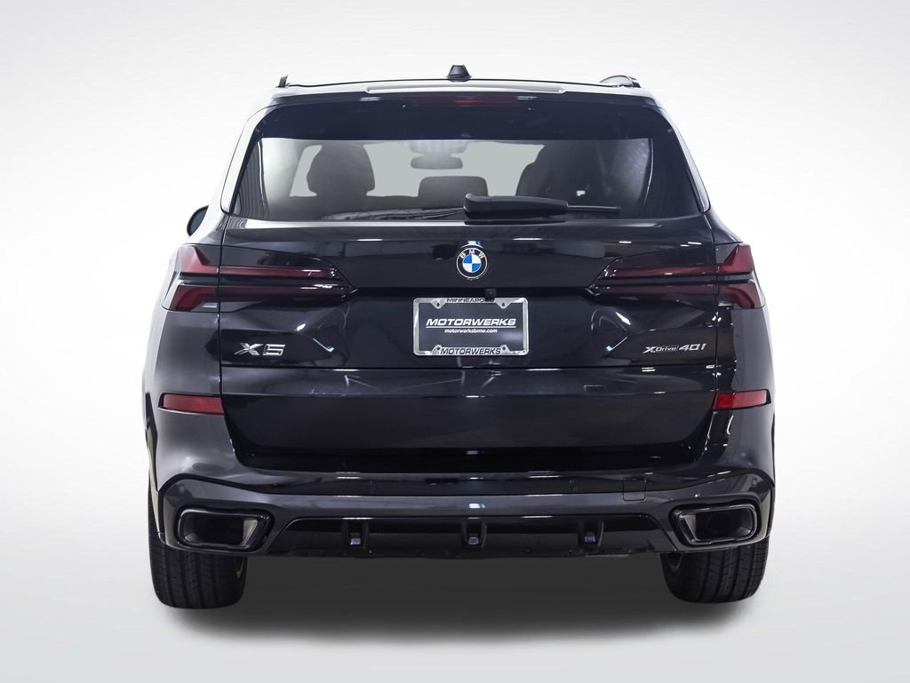Certified Used 2024 Black Sapphire Metallic BMW xDrive40i image 4