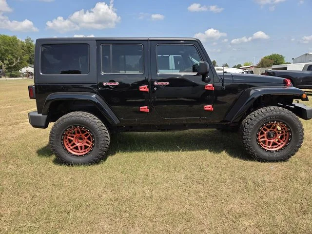 Used 2014 Black Jeep Unlimited Sahara image 10