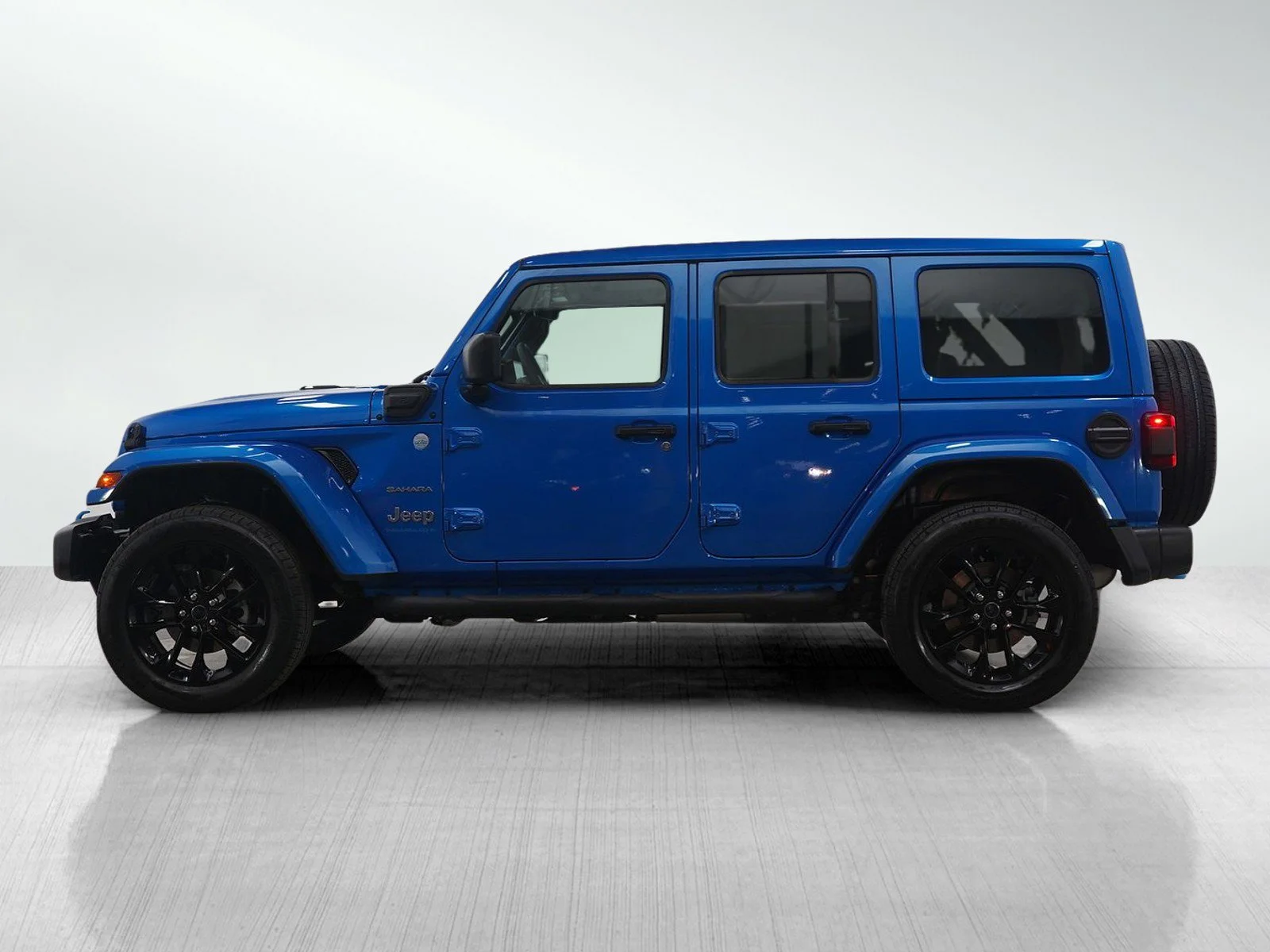 Used 2024 Jeep Wrangler 4xe Sahara 4XE with VIN 1C4RJXP68RW187859 for sale in Hopkins, Minnesota