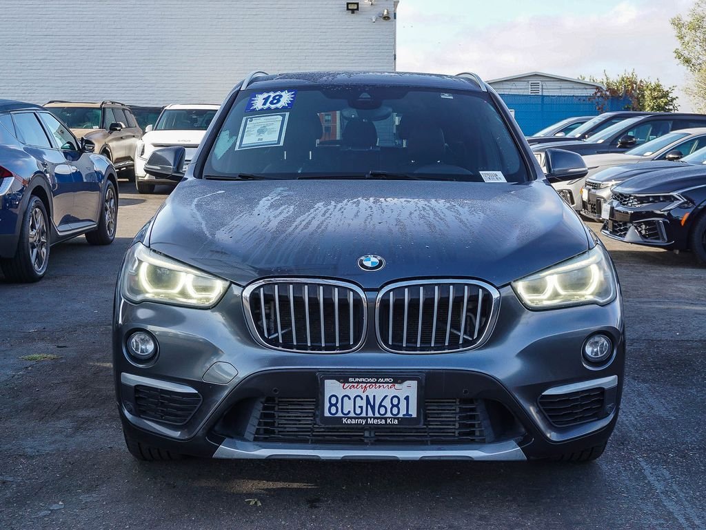 Used 2018 BMW X1 28i with VIN WBXHU7C38J5H43165 for sale in San Diego, CA
