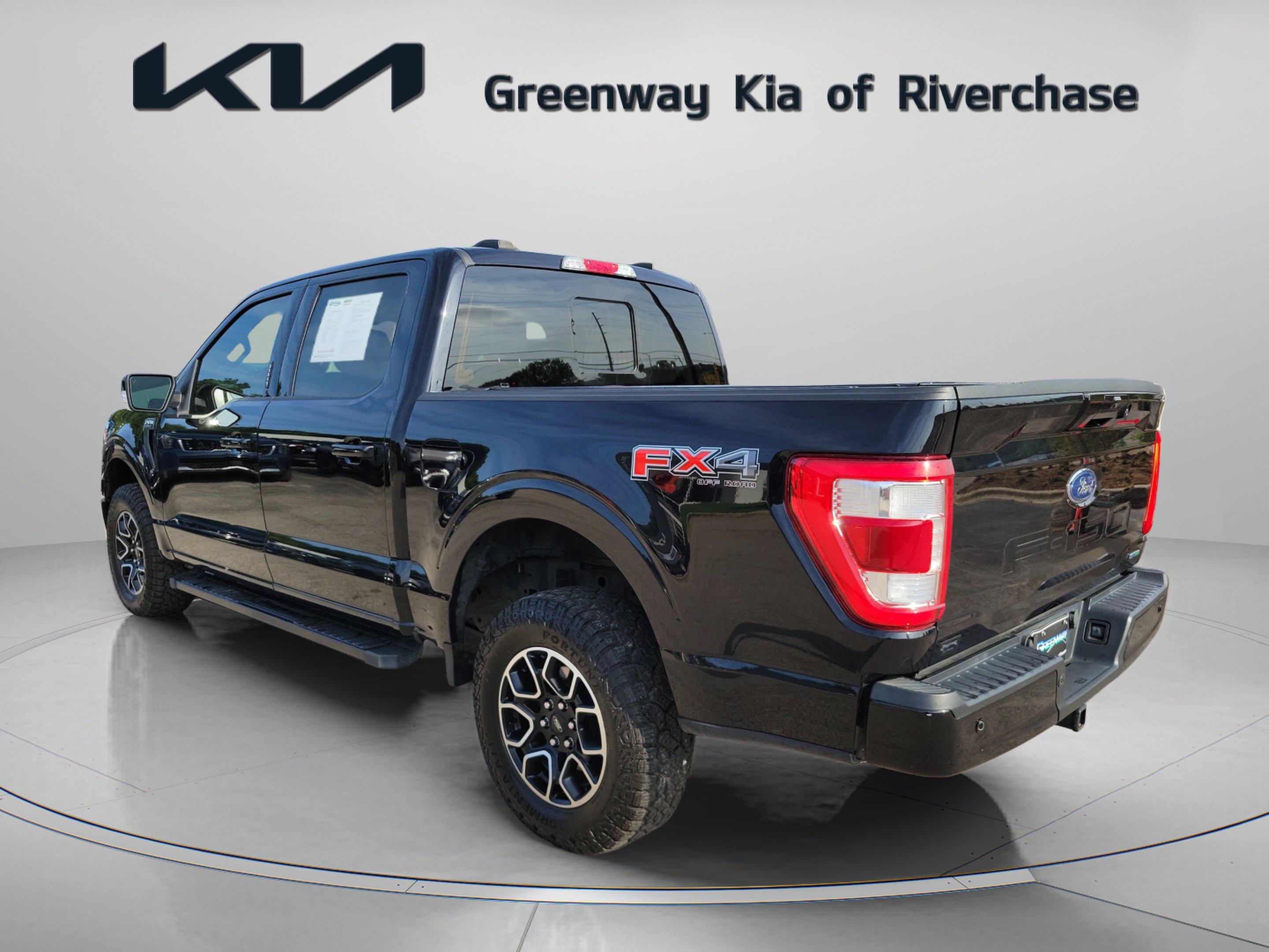 Used 2022 Black Metallic Ford Lariat image 4