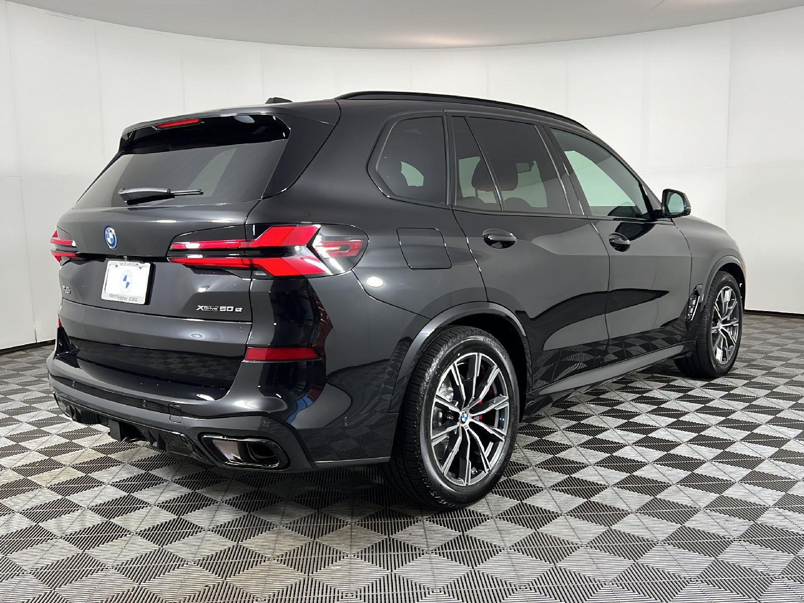 New 2026 Black Sapphire Metallic BMW xDrive50e image 3
