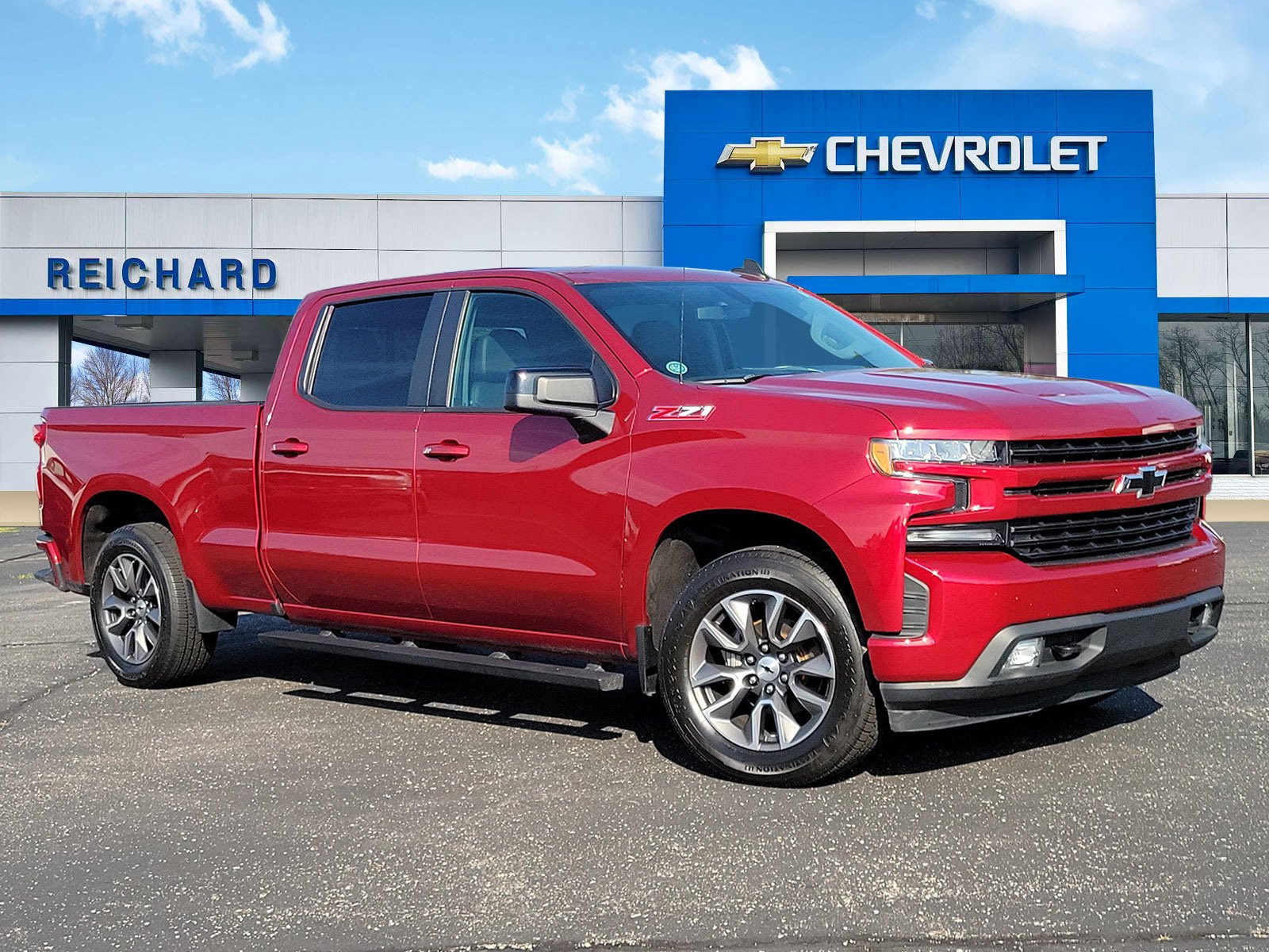 Used 2021 CHERRY RED TINTCOAT Chevrolet RST image 1