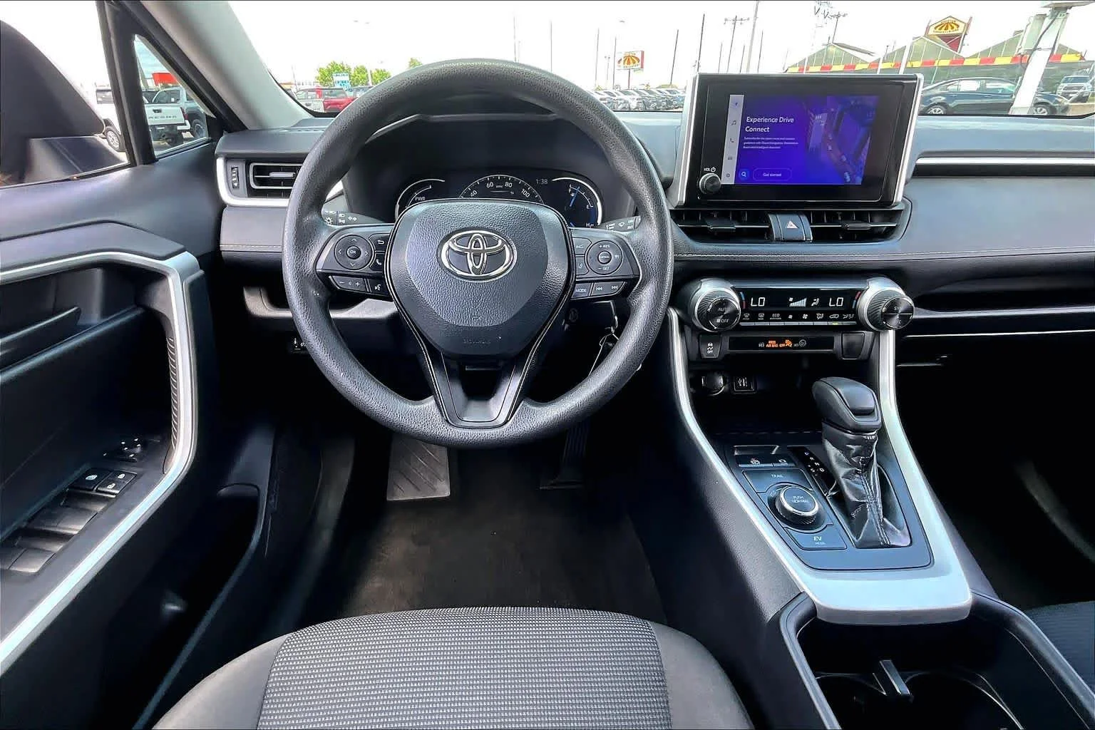 Used 2024 Midnight Black Metallic Toyota Hybrid LE image 6