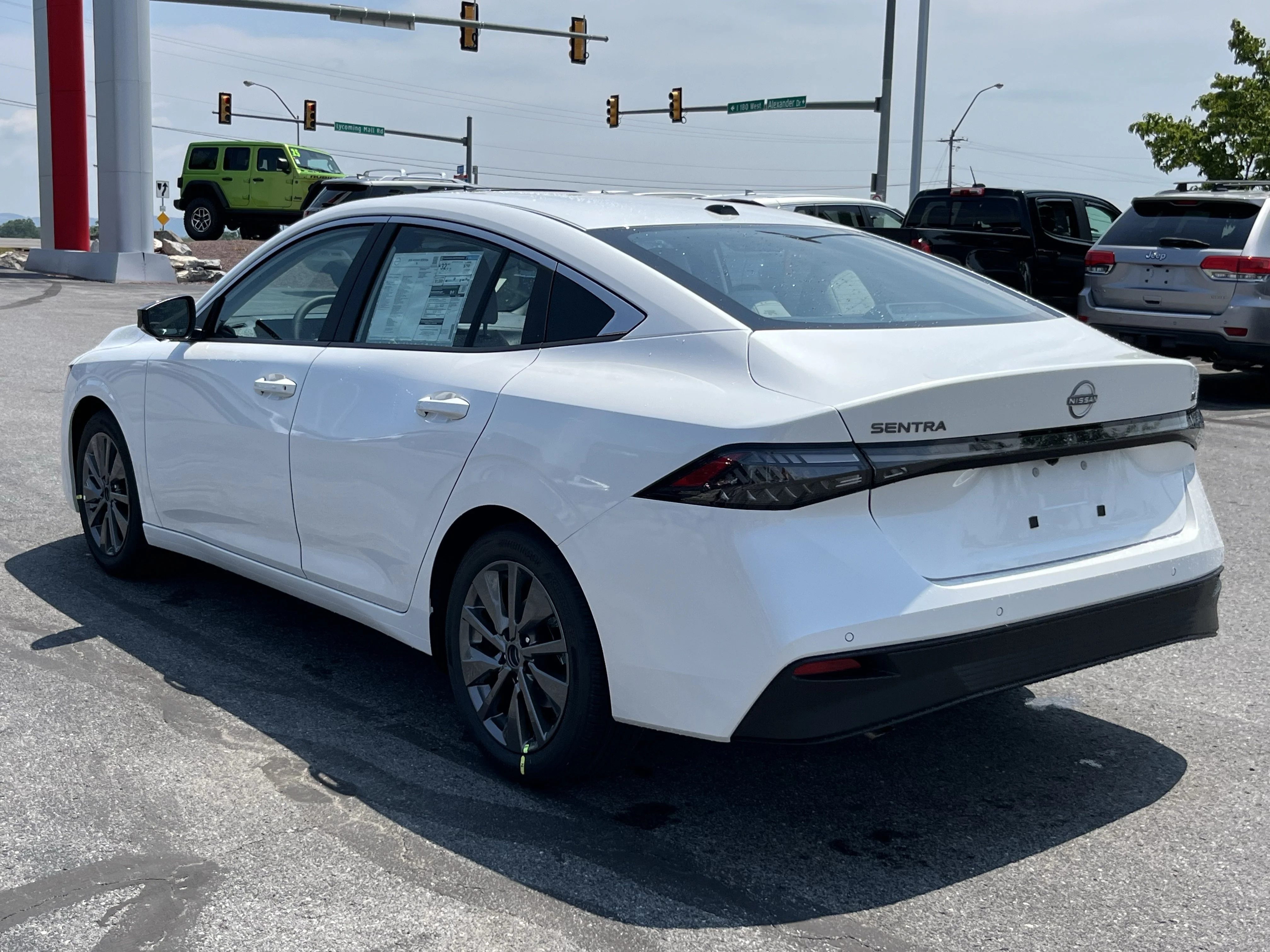 New 2026 Aspen White TriCoat Nissan SL image 8
